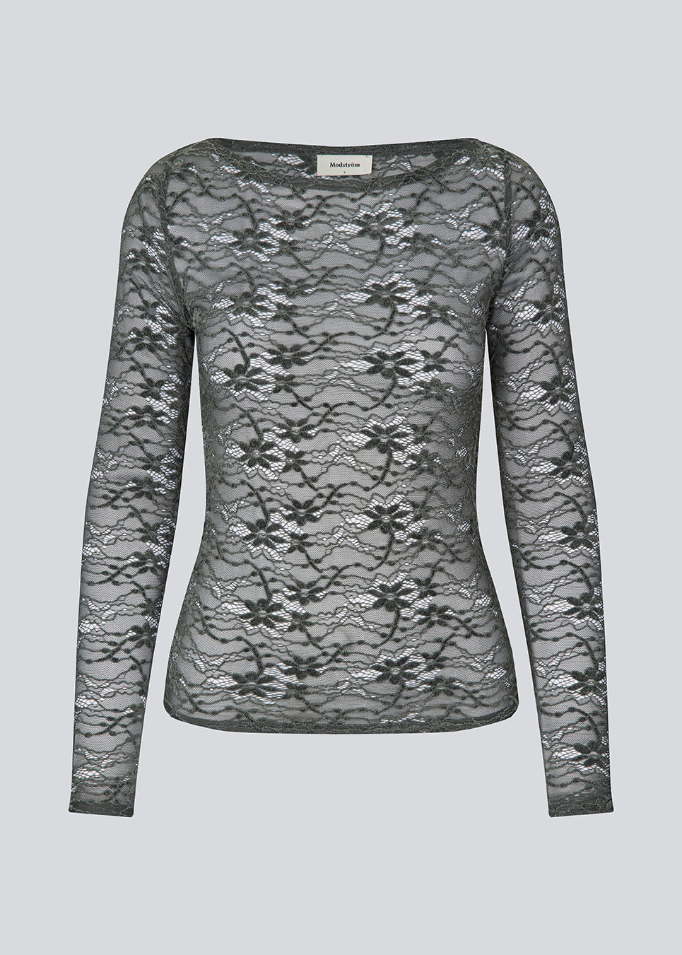 Fitted top in dark green in a see-through lace material. TildeMD top has long sleeves and a wider neckline. 