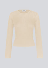 Fine knit jumper in summer sand in a drapy quality. TomMD o-neck has a slightly cropped length with long, flared sleeves. Ribknit on neckline and hem.