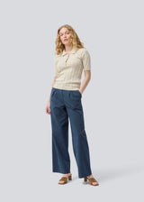 Soft knittet polo in 100% organic cotton. ToniaMD SS polo has short sleeves and a placket with 4 buttons.