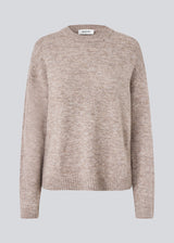 Loose knit in beige melange in plain jersey knit. TreeMD o-neck has a round neckline and long loose sleeves.