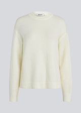 Loose off white knit in plain jersey knit. TreeMD o-neck has a round neckline and long loose sleeves.