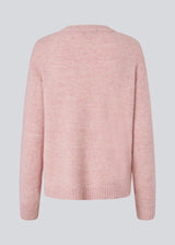 Loose knit in a light rose color in plain jersey. TreeMD o-neck has a round neckline and long loose sleeves.