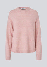 Loose knit in a light rose color in plain jersey. TreeMD o-neck has a round neckline and long loose sleeves.