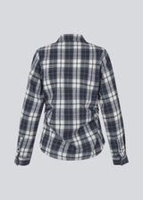 Fitted shirt in flannel. TappoMD shirt has a button closure in front and a manchet with button closure. 