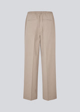 Comfortable suit trousers in beige with an elasticated waistband at the back. The UcheMD Pants feature a concealed zip fastening, pressed creases, and combine relaxed comfort with an elegant finish. Made from 63% recycled polyester. The model is 175 cm and wears a size S/36.
Style the pants with matching vest and blazer
Material:
4% Elastane
63% Recycled Polyester
33% Rayon
Lining:
100% Polyester