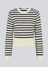 Classic striped sweater in navy and cream. The UlvaMD Stripe O-neck is made from 100% organic cotton and features a round neckline, ribbed trims, and a soft, comfortable fit. A timeless choice for a relaxed and refined everyday look. The model is 175 cm and wears a size S/36.
Material:
100% Organic Cotton