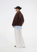 Soft fleece sweater in brown made from 100% recycled polyester. The UrielMD Fleece is designed with a high collar, half-zip closure, and a relaxed fit that creates a modern and effortless look. Perfect for chilly days and casual layering. The model is 175 cm and wears a size S/36.
Material:
100% Recycled Polyester