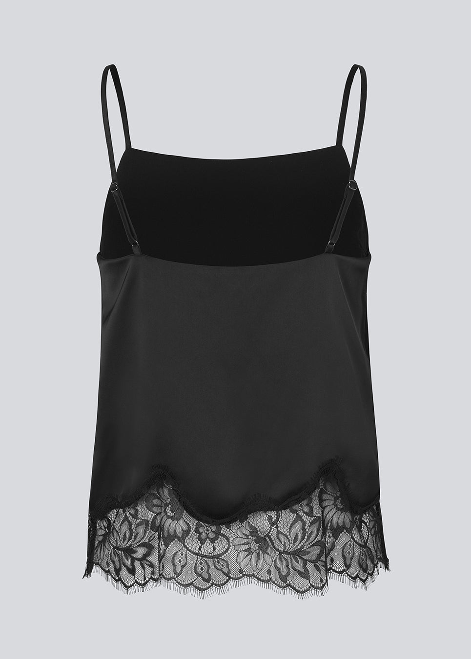 Delicate satin top in black with lace details on the bottom. Vuemd top has adjustable straps and refined lace details at the hem. Perfect worn alone or styled as part of a layered look.