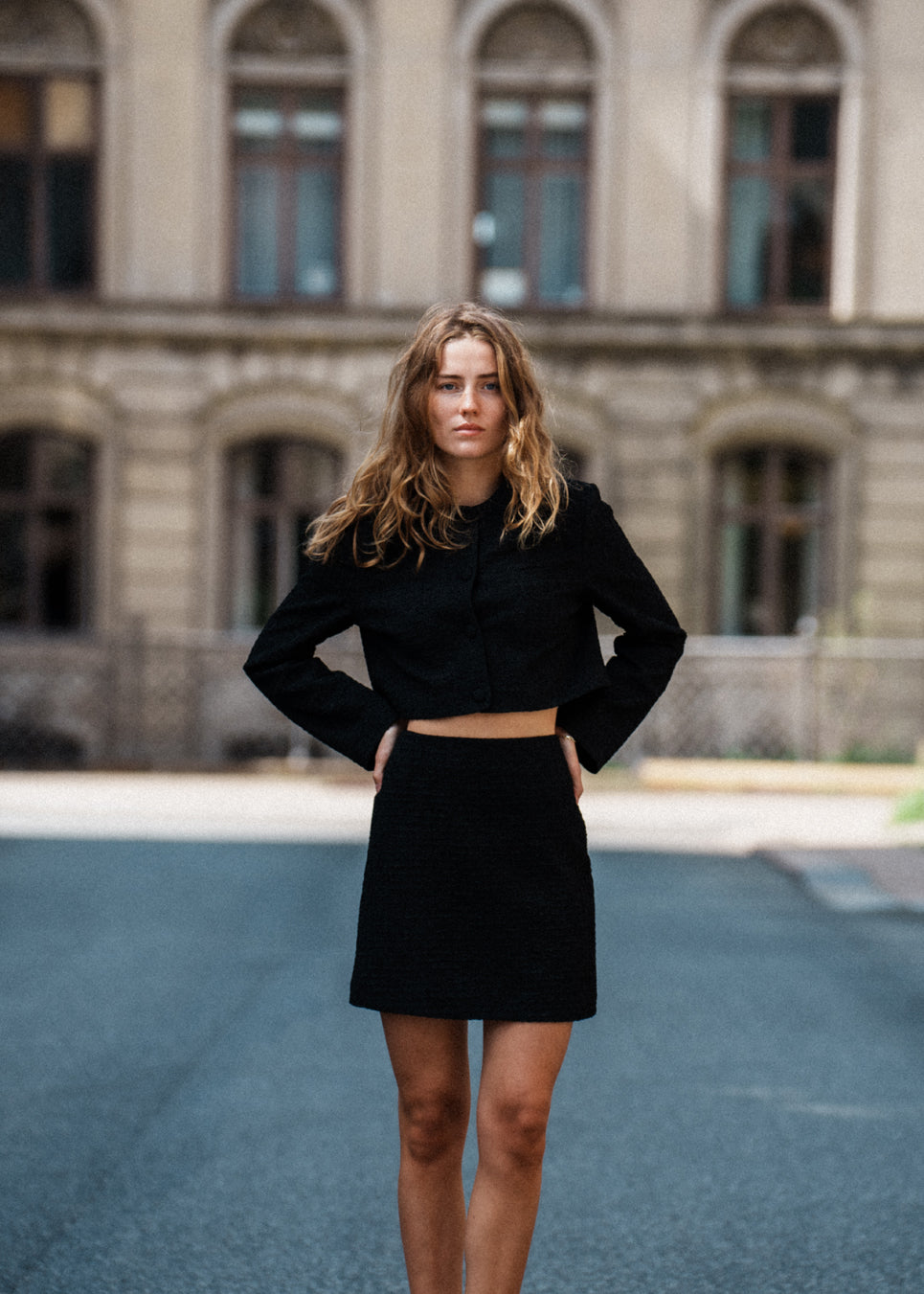 Cropped blazer in a structured material. FaiMD blazer is collarless and has fabric-covered buttons in front and long, slim sleeves. Lined. Style with matching skirt: FaiMD skirt.