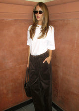 Suit trousers with pleats in corduroy. Pablomd wide pants has long wide legs with side pockets.