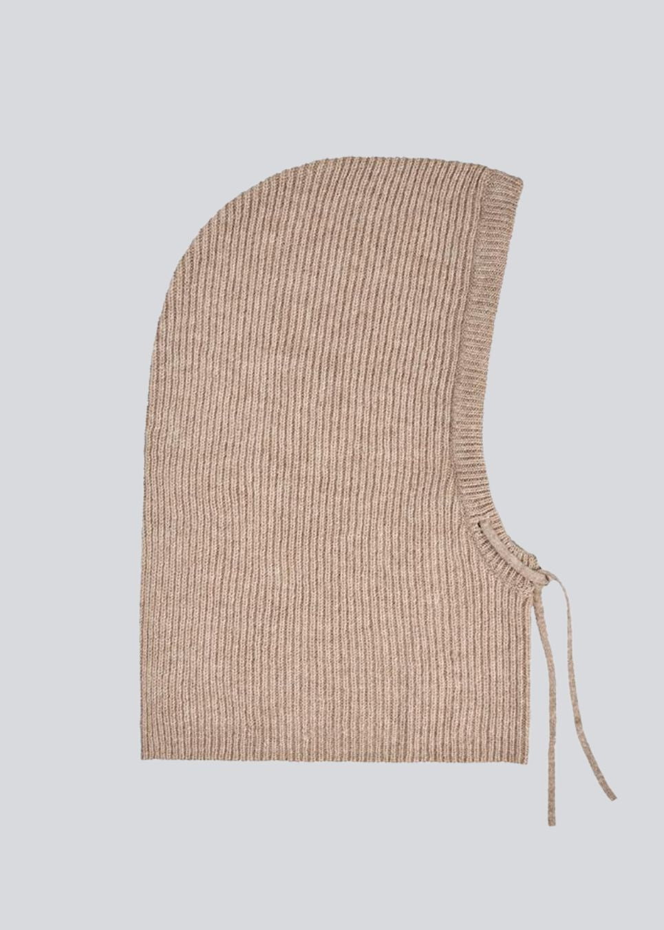 Warm beige balaclava in a nice wool mixture, which will be perfect for the cold days. KarnisMD balaclava is knitted and has strings.