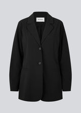 Slim-fitted blazer in black with voluminous sleeves and soft shoulders. BennyMD blazer features buttons, pospoil pocets, collar and notch lapel. No slit on back.