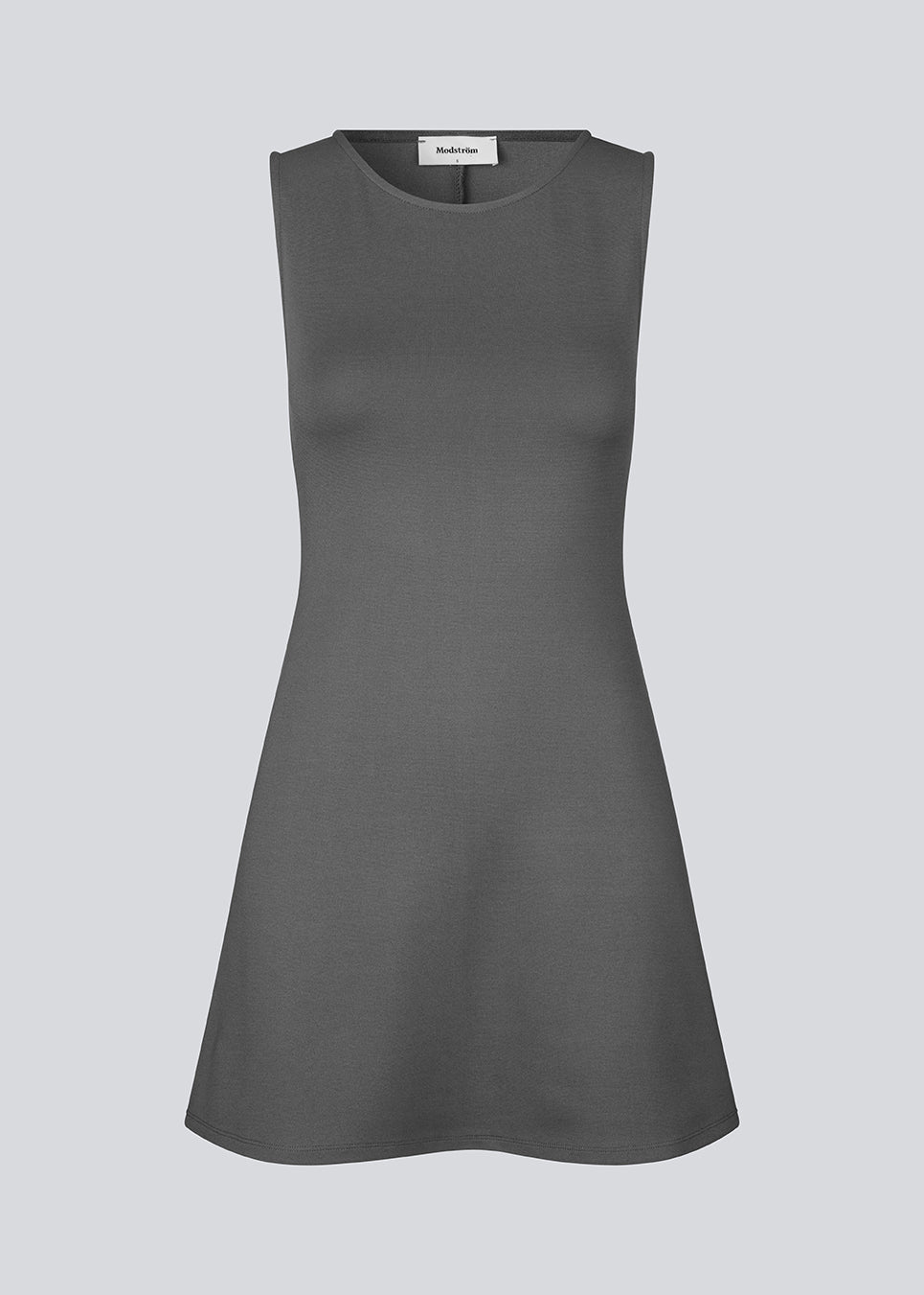 Fitted mini dress in an A-line shape with a round neck and no sleeves. JosefineMD tank flare dress is made from a stretchy material. The model is 177 cm and wears a size S/36.
