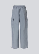 Cargo pants in the color dusk in nylon with elastic waistline and adjustable hems with elastic drawstrings. TrentMD pants have patch pockets on the legs.
