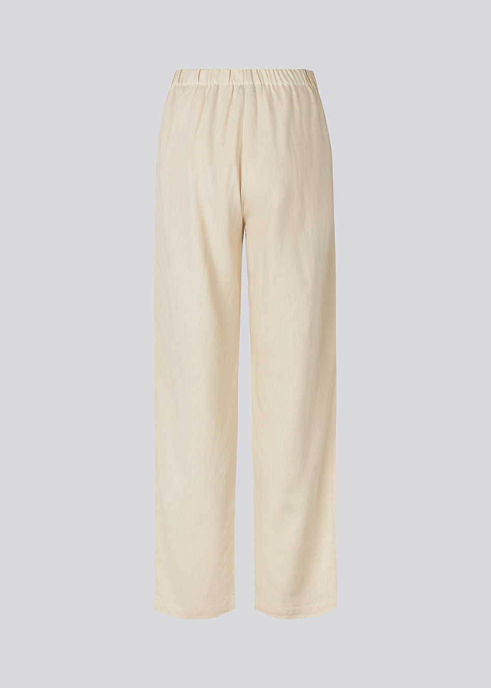 Long pants in beige with a relaxed fit and long wide legs and an elasticated waist for extra comfort. TulsiMD pants are made from a soft mix of linen and rayon.