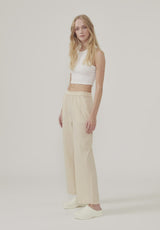 Basic top cut from a soft ribbed jersey fabric. IgorMD crop top in the color Off White is styled with a slim fit and cropped fit with racer-shaped back. Perfect for a sporty look. The model is 173 cm and wears a size S/36
