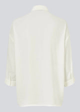 Beautiful shirt in a classic design. Alexis shirt has a collar and is closed at front by buttons. The shirt has 3/4 lenght sleeves and a chest pocket, which adds details.