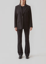 Oversized blazer with a drapey fit. AnkerMD blazer has collar and notch lapels with a single button closure. Flap welt front pockets. Slits on cuffs and single back vent. Lined.  Buy matching pants or skirt: AnkerMD pants, AnkerMD wide pants or AnkerMD skirt, in the same color to complete the look.