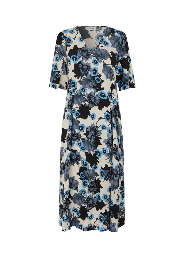 Dress in EcoVero viscose with print, 3/4 length puff sleeves and a v-neckline. AnnalieMD print dress has a cutline at the waist with a box pleat.