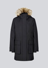 Technical jacket with natural down filling. The BaseMD jacket has adjustable hood with fauw fur piping and big pocket in front and piped pockets by the chest. The style has long sleeves with ribbed cuffs.