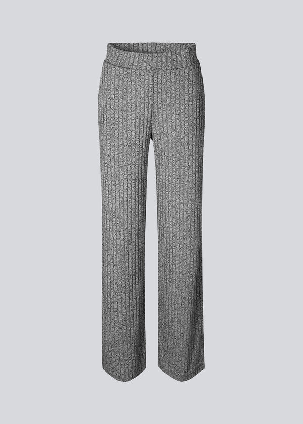 Melange knit pants in grey with a relaxed shape. BeckMD pants are made from a stretchy, rib-knitted quality with wide legs and covered elasticated waist. A matching top is available here: BeckMD top.