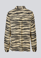 Shirt made from recycled materials. BeckyMD print shirt offers a relaxed fit with wide sleeves with cuff, shirt collar, and button closure in front.