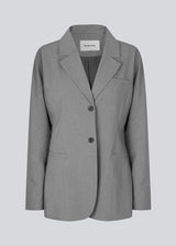 Slim-fitted blazer in grey with voluminous sleeves and soft shoulders. BennyMD blazer features buttons, pospoil pockets, a collar, and a notch lapel. No slit on the back.