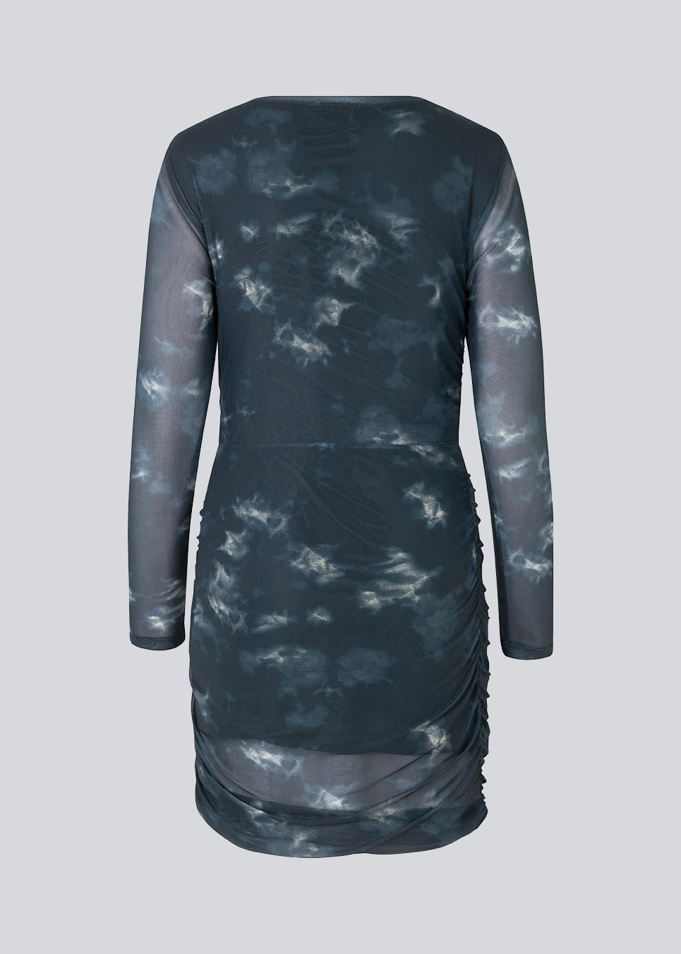 Short dress with draped details and multiple layers. CliffordMD print dress has a round neck and long sleeves in mesh.  The model is 177 cm and wears a size S/36.