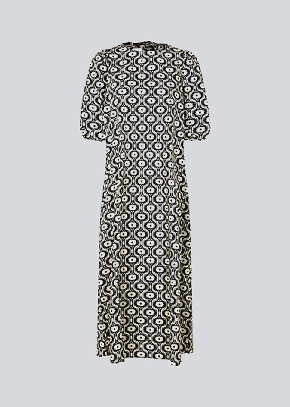 Long dress with a wide skirt and voluminous puff sleeves. CoraMD print dress has a round neck with a cut out and bow in the back. Made from organic cotton.  The model is 174 cm and wears a size S/36.