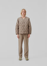 CordeliaMD shirt is made from cotton. Pajama-inspired pants with long, wide legs and a medium waist with elastic and ties. CordeliaMD pants are cut from cotton.  Shop matching shirt for the pants: CordeliaMD shirt.