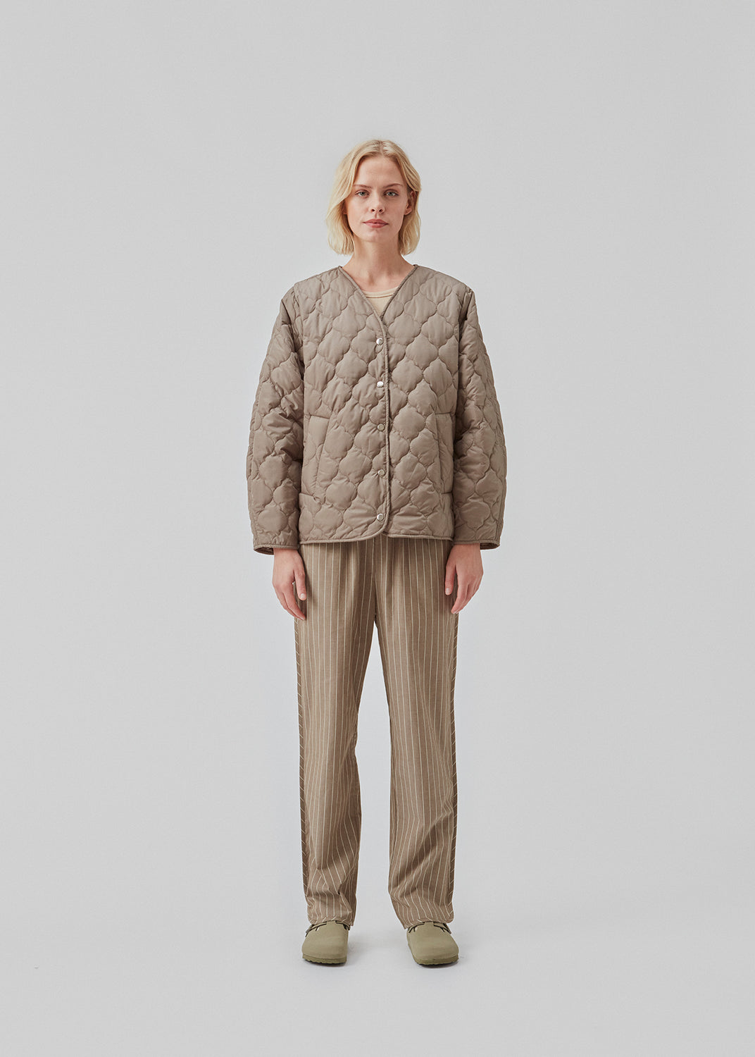 CordeliaMD shirt is made from cotton. Pajama-inspired pants with long, wide legs and a medium waist with elastic and ties. CordeliaMD pants are cut from cotton.  Shop matching shirt for the pants: CordeliaMD shirt.