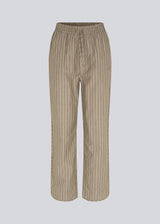 CordeliaMD shirt is made from cotton. Pajama-inspired pants with long, wide legs and a medium waist with elastic and ties. CordeliaMD pants are cut from cotton.  Shop matching shirt for the pants: CordeliaMD shirt.