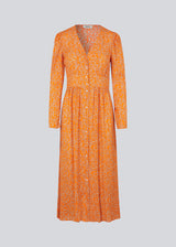 Long dress with puff sleeves and floral print in EcoVero viscose. CorinnaMD print dress is designed with buttons in front and a pretty detail at the waist.
