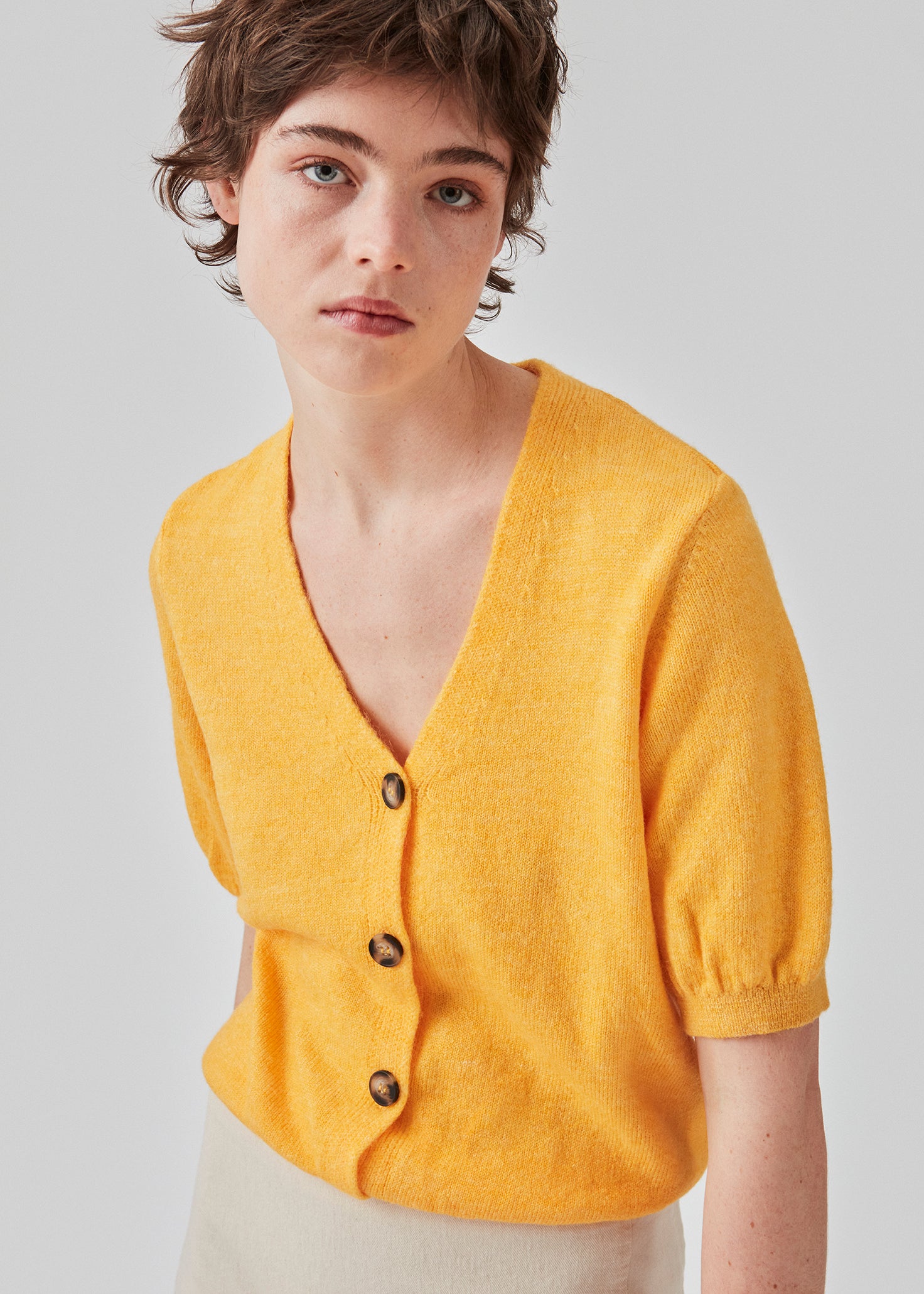Yellow gold cardigan top