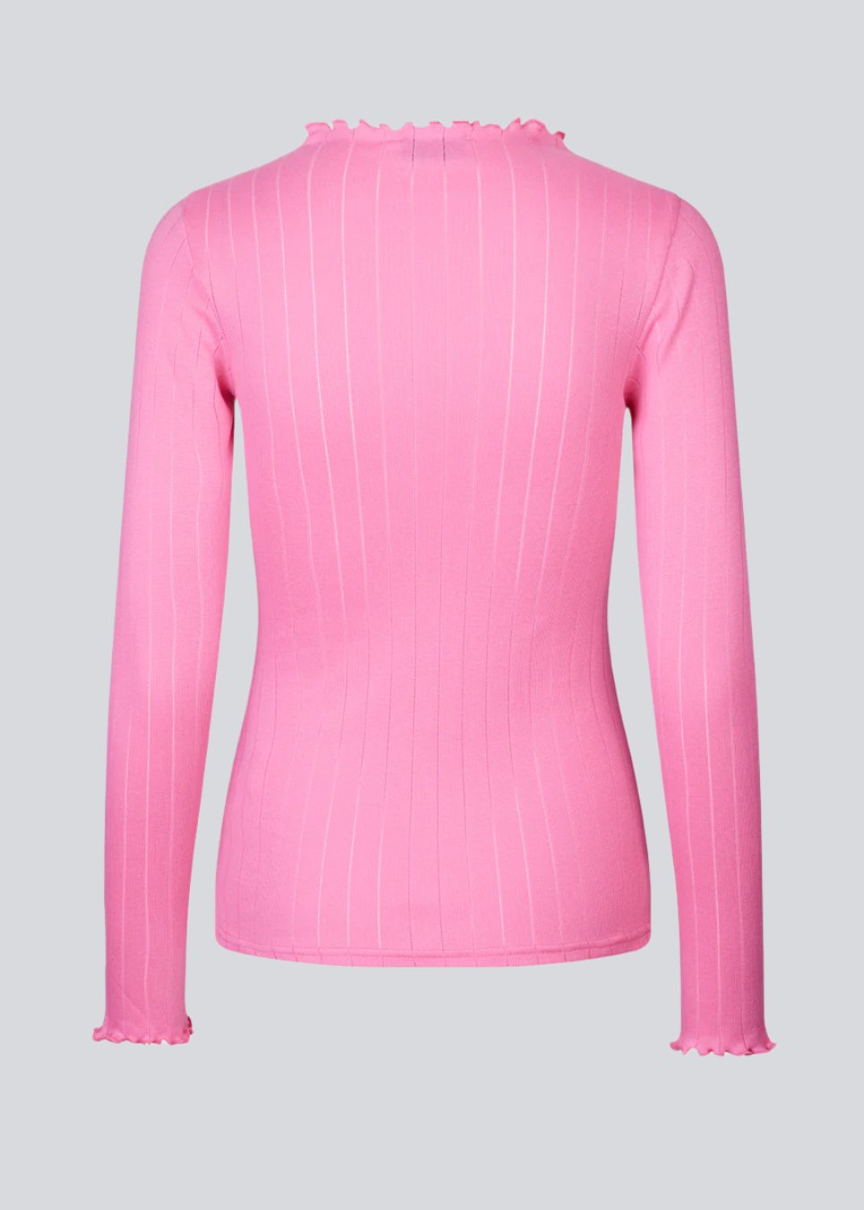 Tight fitted t-shirt in pink with a medium high neck. Issy t-neck has feminine lettuce hem on neck and sleeves. The quality is a soft jersey with a feminine pointelle pattern.