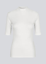 Short-sleeved t-shirt with a high neck. Krown t-shirt is in a nice rib quality and has a tight fit. A must-have basic styles in your waredrobe.