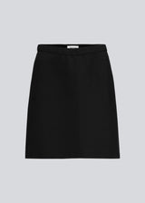 Simple and a must-have stylish A-shaped skirt. Tanny short skirt has elastic at the waist and the strechable material creates the perfect fit.