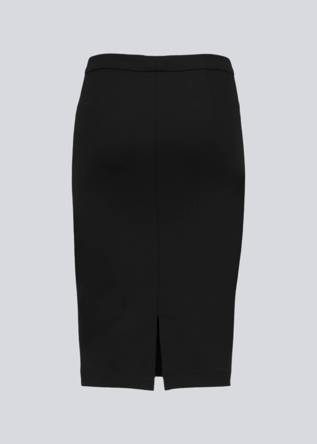 Simple, stylish and a must-have tight skirt. Tanny skirt is knee length and has a small slit at the back. The stretchable material creates a perfect fit. The model is 174 cm and wears a size S/36