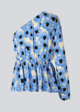 Top with one balloon sleeve with elastic cuff. TorahMD print one shoulder top has a relaxed fit with elasticated cutline at the waist.