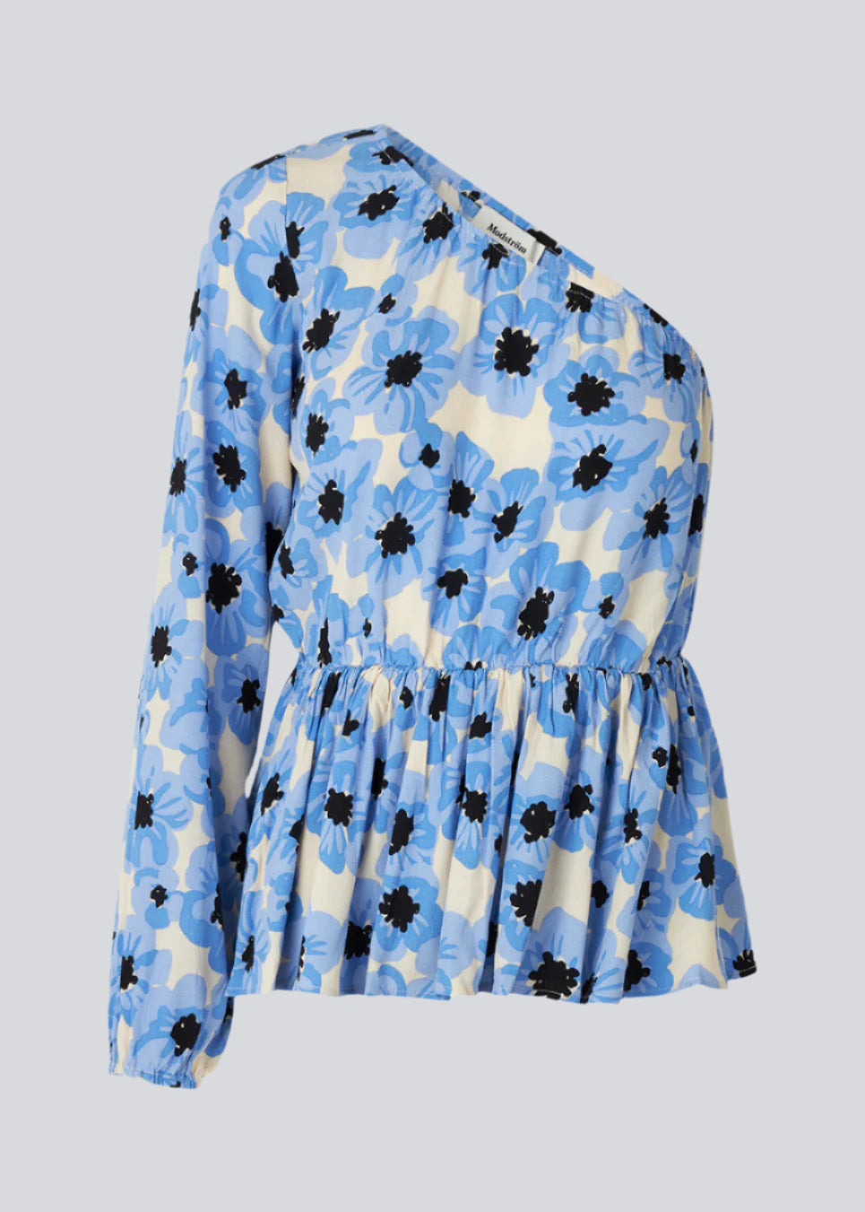 Top with one balloon sleeve with elastic cuff. TorahMD print one shoulder top has a relaxed fit with elasticated cutline at the waist.