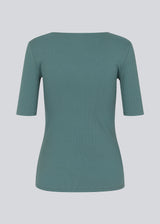 Tight fit top in blue in a ribbed cotton jersey with a deep neckline in front and short sleeves cutting just above the elbow.