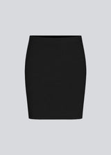 Nice and short basic skirt from Modström. Tutti skirt in Black has a slim fit and a must-have basic style in your waredrobe.