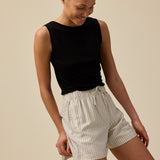 Shorts with a relaxed fit and tieband in the waist. IsabelMD shorts has a medium-high waist with elastic and side pockets.