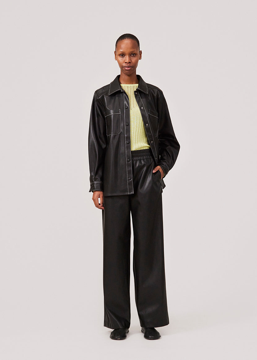 Faux leather pants with straight, wide legs. FaminaMD pants have a high waist with elasticated and are lined for extra comfort. The model is 175 cm and wears a size S/36.  Style the pants with the matching shirt in the same color: FaminaMD shirt.