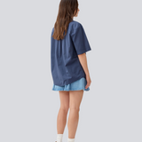 Shortsleeved shirt with a loose fit. MaudeMD SS shirt has cheast pocket, shirt collar and a button closure in front.