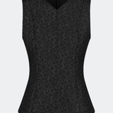 Tailored top without sleeves made from a structured material. HollisMD top has a high v-shaped neckline with a hidden zipper at the neck.&nbsp;