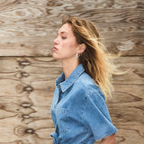 Short denim playsuit with a tieband in 100% organic cotton. NaomaMD solid playsuit has a button closure in front, a shirt collar, and side pockets.