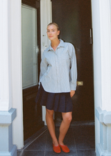 Classic shirt with an opening in the back and bow details. MilleMD stripe shirt has a oversize fit and a cuff with button closure.&nbsp;

