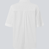 Shortsleeved shirt with a loose fit. MaudeMD SS shirt has cheast pocket, shirt collar and a button closure in front