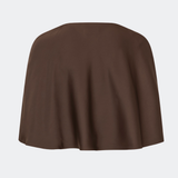Tailormd Cape is an elegant satin cape designed to add a refined and dramatic finish to any outfit. It drapes effortlessly over the shoulders and fastens at the front with a decorative knot detail, creating a soft, fluid silhouette. Layer it over a dress for special occasions or style it with a simple top for an elevated, sophisticated look. The model is 175 cm tall and is wearing a size S/36.